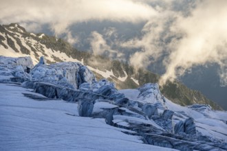 Glacier ice with crevasses in the evening light, Glacier du Tour at sunset, High alpine mountain