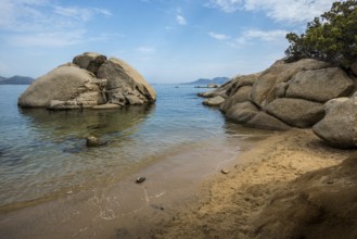 Lonely beach with granite rocks, Spiaggia Li Cuncheddi, Capo Ceraso, near Olbia, Sardinia, Italy,