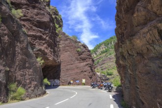 Tunnel and motorbikes at the old bridge over the Daluis gorge, Daluis, Département Alpes-Maritimes,