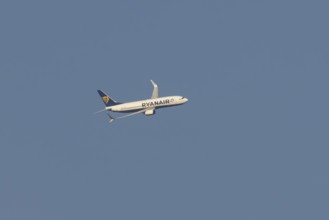 Boeing 737 jet passenger aircraft of Ryanair flying in a blue sky, Rome, Italy, Europe