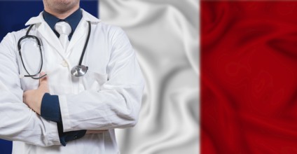 Male doctor with stethoscope on France flag. Doctor holding stethoscope on French flag