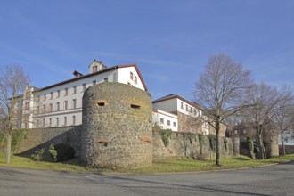 Historic town wall with defence defence tower and town fortifications, castle complex, Friedberg,