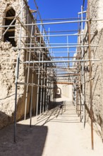 Scaffolding in the largest preserved mud town in Oman, Al Bilaad, Al Bilaad Historical Village,