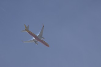 Boeing 767 jet aircraft of DHL airlines flying in a blue sky, England, United Kingdom, Europe