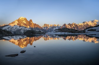 Evening mood, mountain landscape at sunset, alpenglow, water reflection in Lac Blanc, mountain