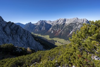 Mountain landscape in autumn, view of the Leutasch valley with mountain peak of the Wetterstein