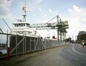 'Pic River' cargo ship (built 1896) and quayside cranes, Welland canal, St Lawrence seaway, Great