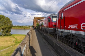 The railway bridge Duisburg-Hochfeld-Rheinhausen, over the Rhine, regional trains and many goods