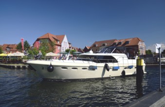 Europe, Germany, Mecklenburg-Western Pomerania, island town of Malchow, Lake Malchow, jetty, motor