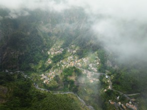 Aerial drone view of Curral das Freiras village in Valley of the Nuns from Miradouro da Eira do