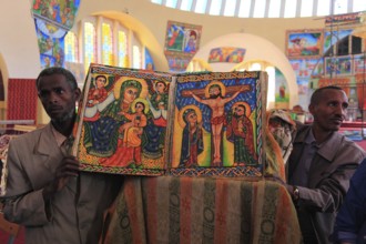 Tigray region, Axum, Aksum, St Mary's Cathedral, Maryam Tsion, inside, church servant shows old