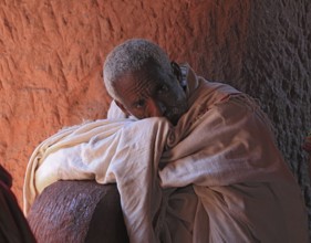 Lalibela, at the eastern group of rock-hewn churches, pilgrims in the double church of