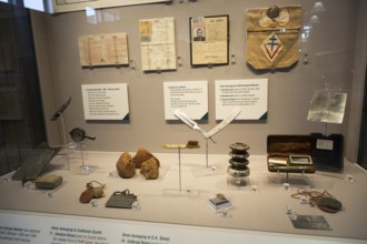 Display cabinet of second world war Prisoner of War objects, REME museum, MOD Lyneham, Wiltshire,