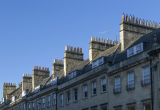 Chimney pots on roof of Georgian houses, Bridge Street, Bath, Somerset, England, UK