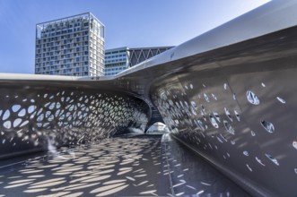 The Parkbruk, cycle and pedestrian bridge in the city centre of Antwerp, crosses a multi-lane city