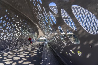 Light effects from the sun in the Parkbruk, a cycle and pedestrian bridge in the city centre of