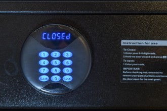 Room safe in a hotel, keypad for entering a 6-digit numerical code to lock the safe for depositing