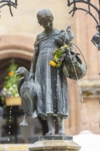 The Gänseliesel fountain is a market and ornamental fountain on the market square in front of the