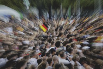 Fans react during the European Championship preliminary round match between Germany and Hungary on