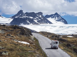 Camper van, mountain crossing Sognefjellsvegen, view towards glacier, mountain pass over the