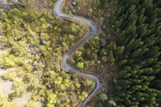 Aerial view of historical mountain pass Tronasen, steep winding road north of Flekkefjord, southern