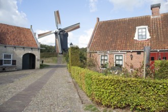 Village square, windmill, fortress, Bourtange, Netherlands