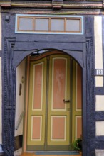 Colourful door, half-timbered, Hannoversch Münden, Hann. Münden, Lower Saxony, Germany, Europe