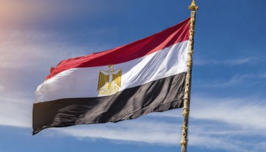 Flags, the national flag of Egypt flutters in the wind