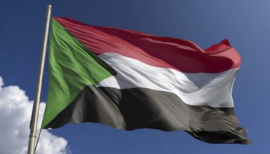 Flags, the national flag of Sudan flutters in the wind