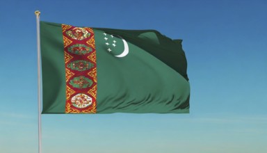 The flag of Turkmenistan flutters in the wind