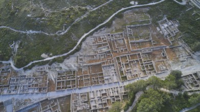 Drone shot, first morning light, Extensive ruins of an ancient site, photographed from the air,