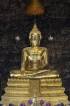 Golden Buddha statue, Bhumispara-mudra, Buddha Gautama at the moment of enlightenment, Wat Suthat