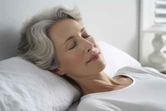 Middle aged woman sleeping peacefully on white pillow. KI generiert, generiert, AI generated