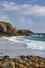 Waves breaking on the rocky coast near Plouarzel on the Atlantic coast, Département Finistère,