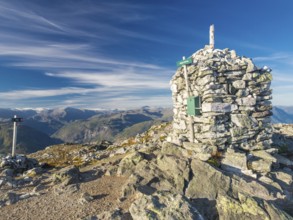 Top of Mt. Molden above the Sognefjord, stone cairn, view towards north, glacier Jostedalsbreen in