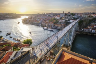 View of Porto city and Douro river and Dom Luis bridge I from famous tourist viewpoint Miradouro da