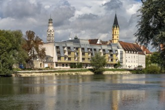 Danube bank, mould tower and St. Alban's Hospital Church in Lauingen Donau, Bavaria, Germany,