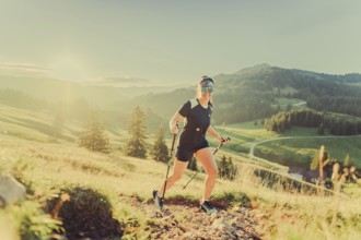 Summer trail running and hiking in the Alps on the Riedberg Pass between Obermaiselstein and