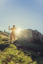 Summer trail running and hiking in the Alps on the Riedberg Pass between Obermaiselstein and