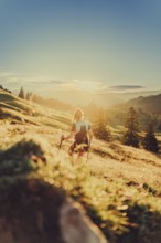 Summer trail running and hiking in the Alps on the Riedberg Pass between Obermaiselstein and