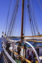 The three-masted schooner SS SVANEN is moored at the quay in the harbour of Strömstad in Bohuslän,