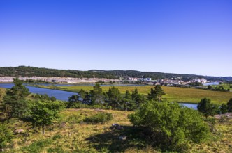 Picturesque view from Bohus Fortress of the surrounding industrial structures and landscape of