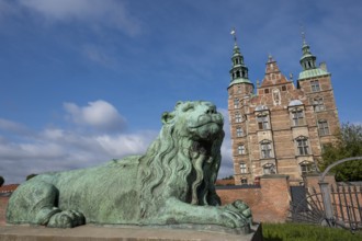 Bronze lion sculpture in front of Rosenborg Palace, 17th century royal palace and museum, Kongens