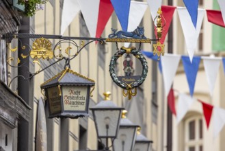 Nose sign in the old town centre of Bamberg. Brewer's star, guild symbol of the brewers.