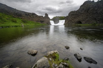 Hjálparfoss waterfall between basalt rocks, Sudurland, Iceland, Europe