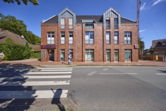 Medical centre, pharmacy and pedestrian crossing on Borkener Straße in Raesfeld, Münsterland,