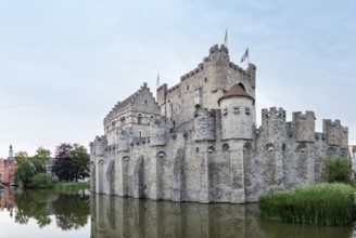 Impressive medieval castle with moat and massive stone walls, Ghent