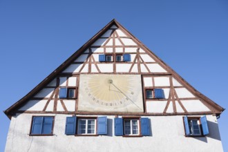 Historic half-timbered house with a sundial in the centre of Scheer, Danube Valley, Sigmaringen