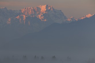 Mountain massif, morning light, fog, haze, spring, snowy, view from Murnau to Zugspitze,