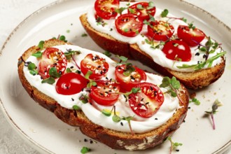 Sandwiches with cream cheese and cherry tomatoes, breakfast, homemade